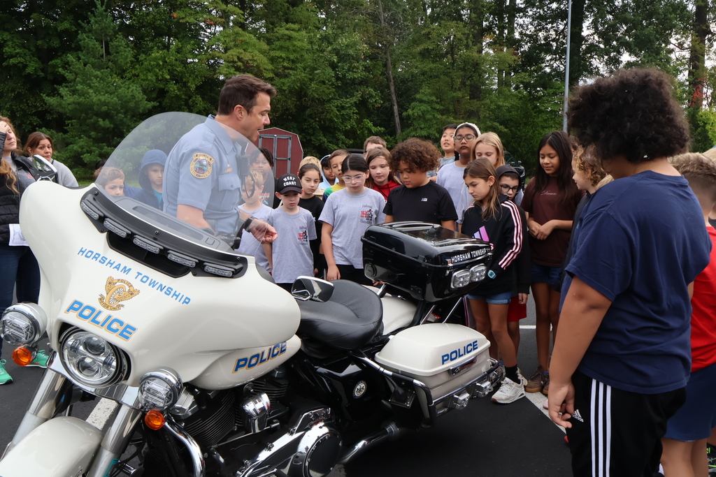 Horsham policeman shows off his bike.