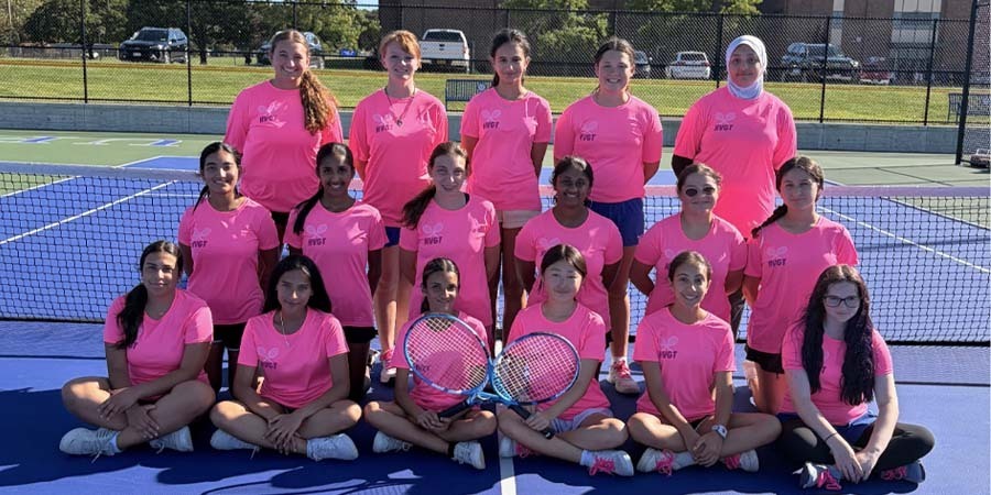 Girls Varsity Tennis Plays for Pink