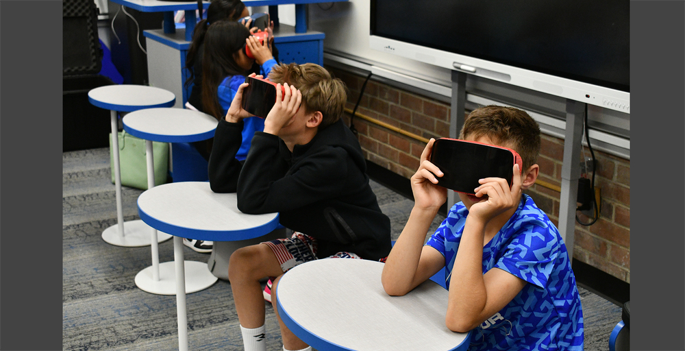 kids using vr goggles