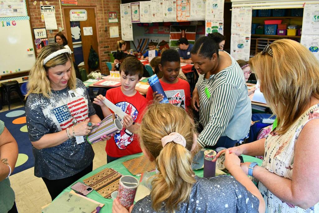students working in the classroom on crafts