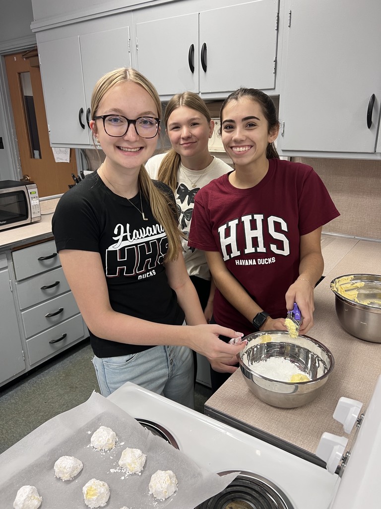 students mixing cookies