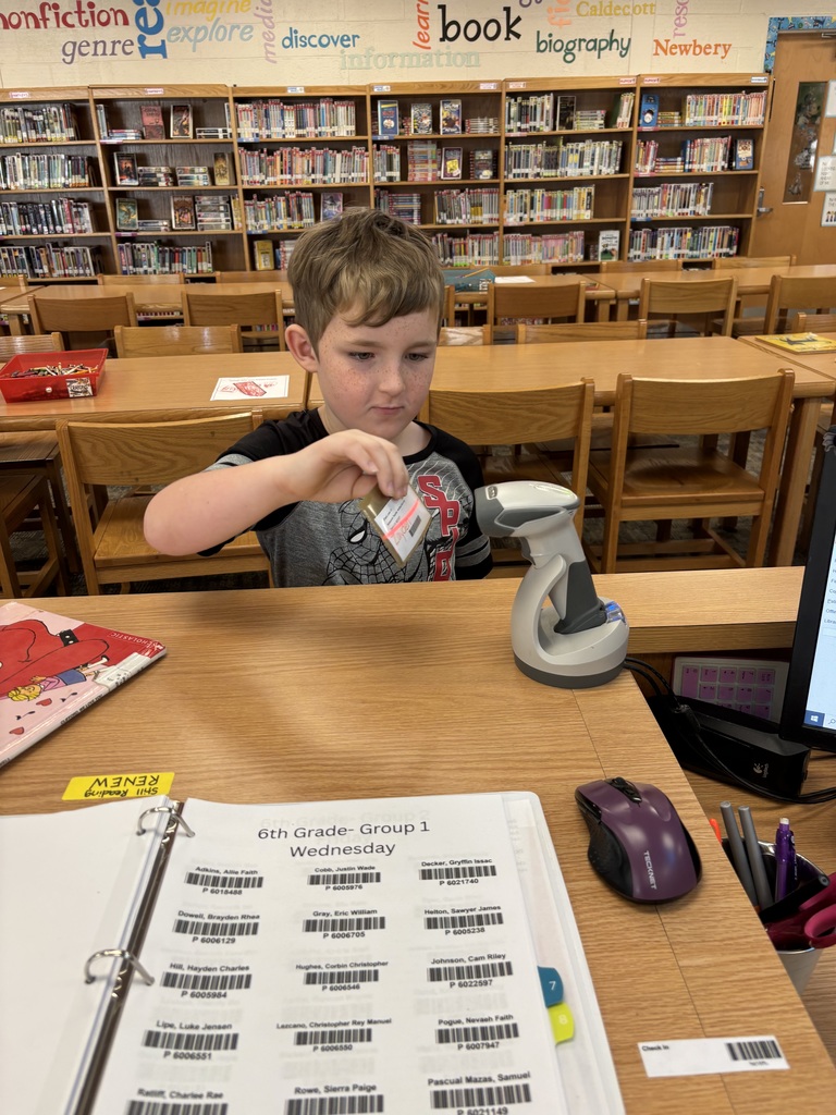 1st Graders doing self checkout