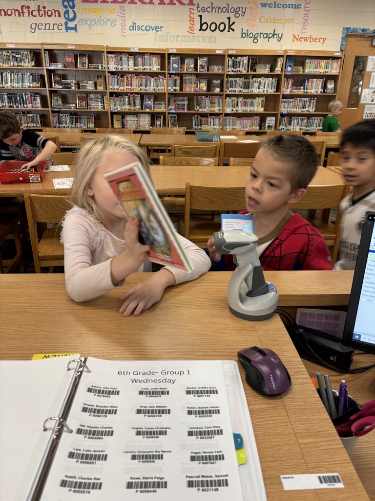 1st Graders doing self checkout