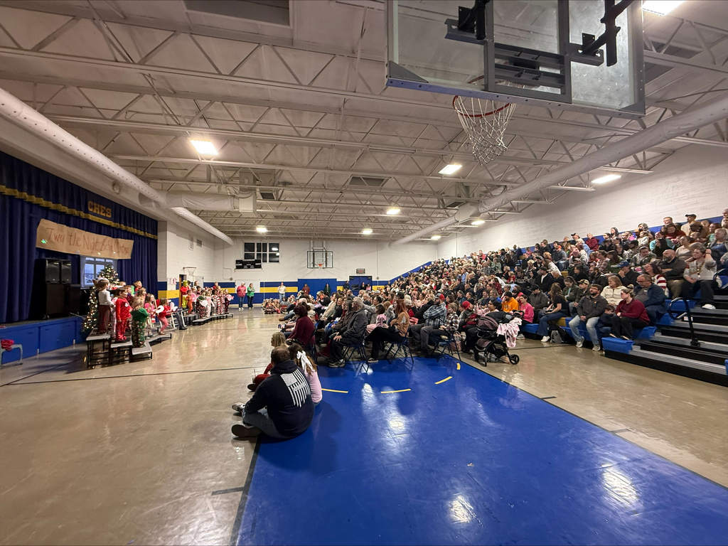 Packed gymnasium for 'Twas the Night Before Christmas Program.