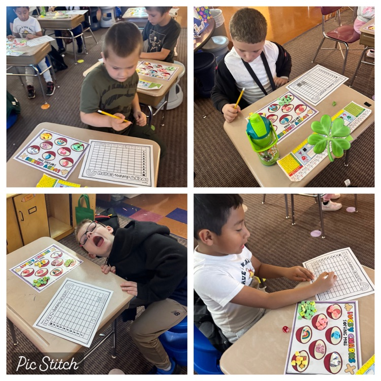 4 students sorting marshmallows at their desk. 