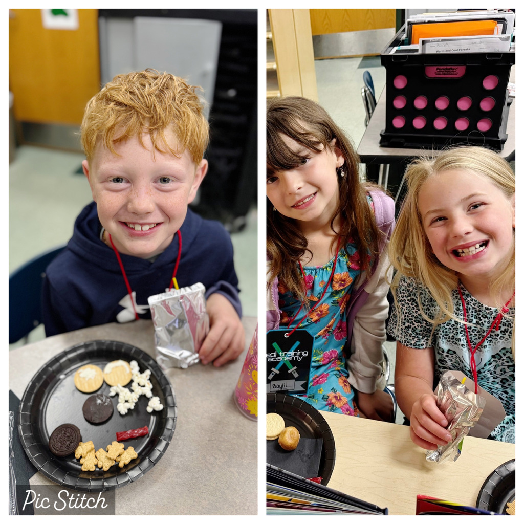 Two children smiling, one with a plate of cookies and popcorn, the other holding a drink. Background shows a school setting.