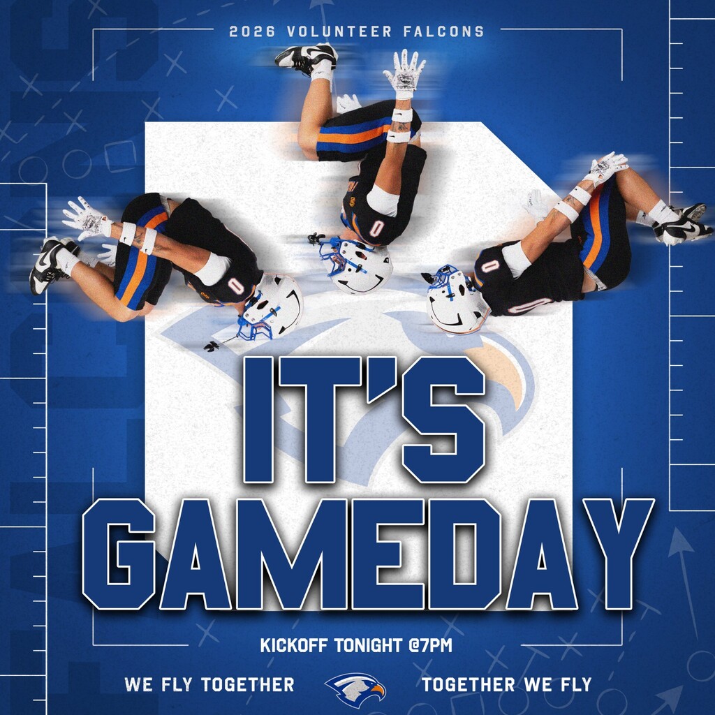 Blue backdrop displays "It's Gameday" text with three players in football gear. One player is upside down, others are standing.