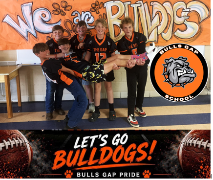 A group of young boys in sports uniforms posing with one boy lifted up. Text reads "We are Bulldogs" above.