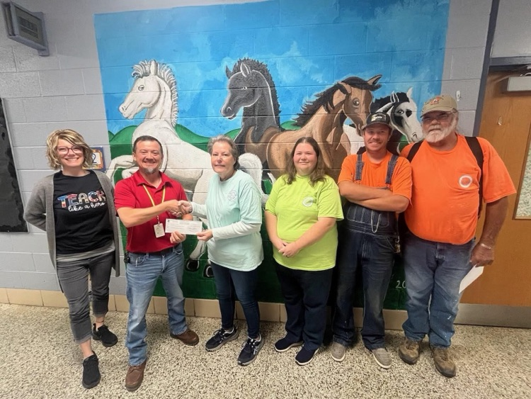 Mooresburg Utility District and the Hamben County Car Club donating proceeds to MES.