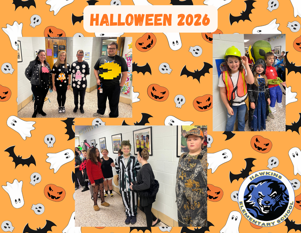 HES staff and students dressed in Halloween costumes.