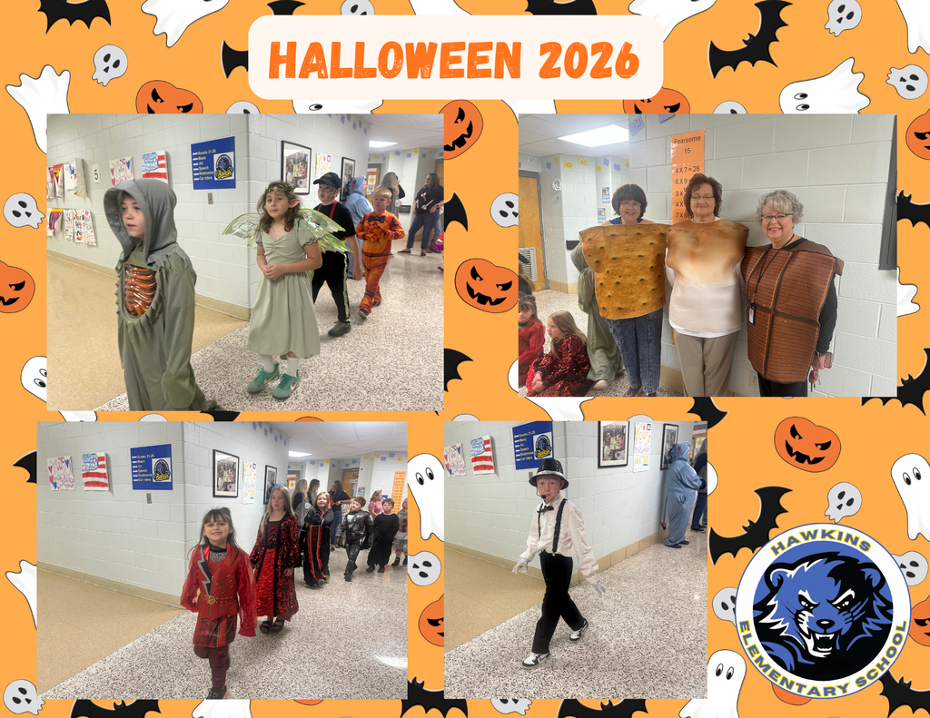 HES staff and students dressed in Halloween costumes.