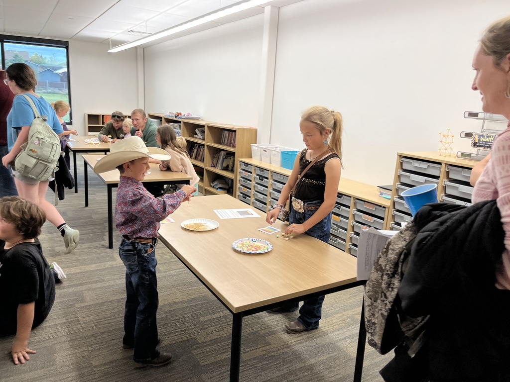 Two students enjoying an activity 