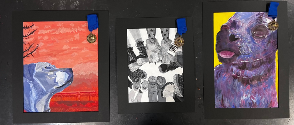 Three paintings by Barton Middle School Students. One painting is of a dog from a side perspective, another of feet and shoes, and the other being a dog.