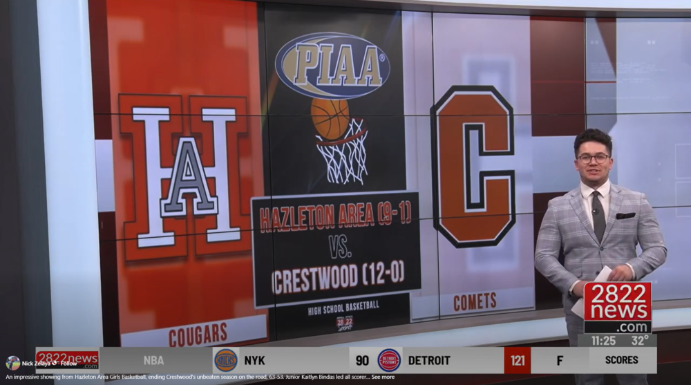 screenshot of sports broadcast from girls varsity basketball game