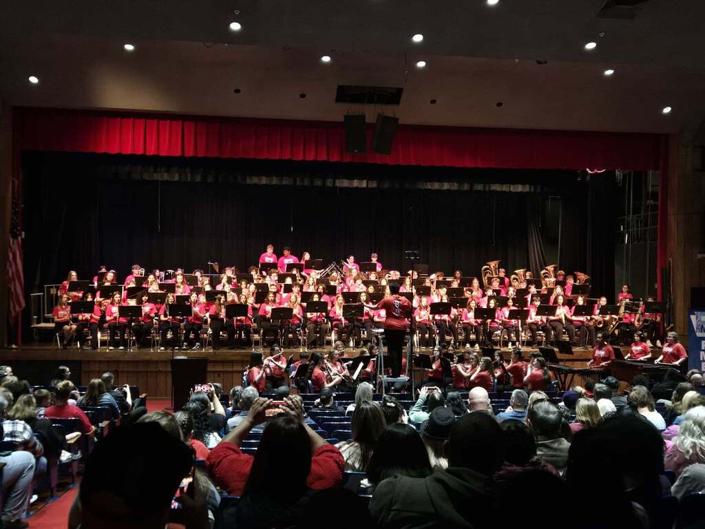 students on stage preforming at band festival