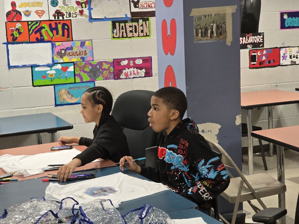 Students coloring their shirts