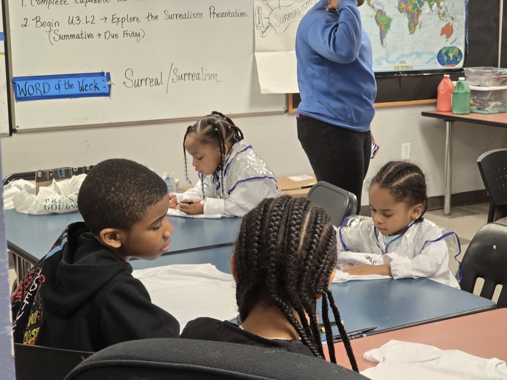 Students coloring their shirts