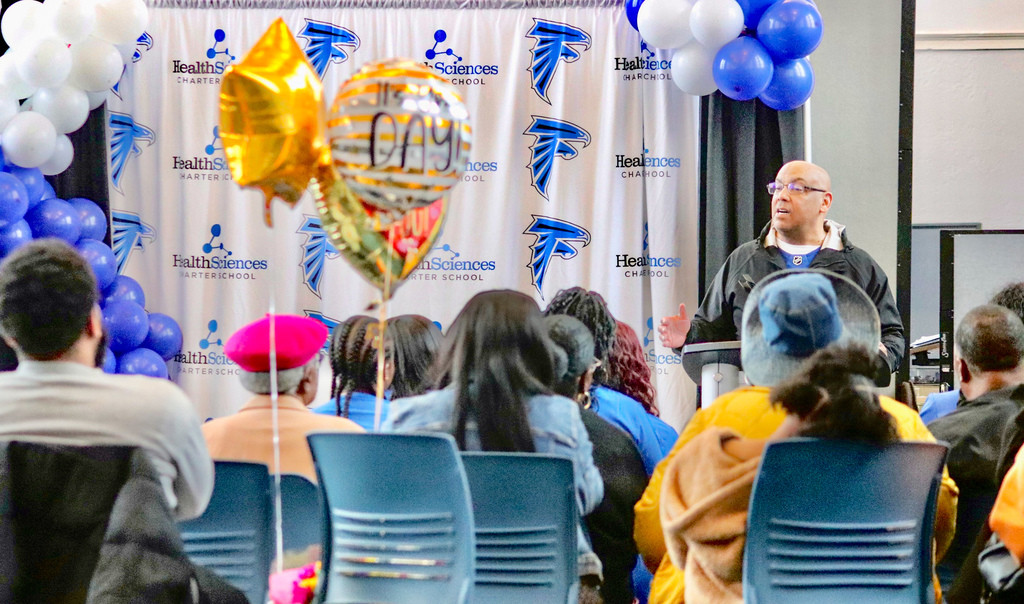 Robert Baxter speaks to the certified students and their families