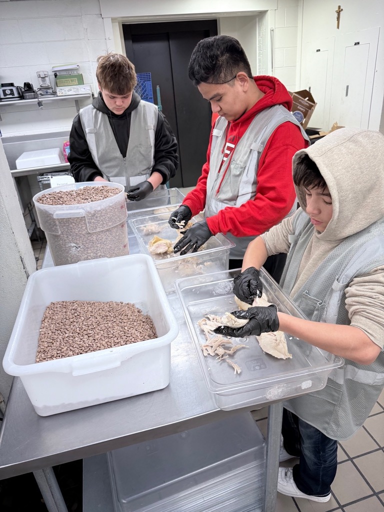 TMP-Marian students prep food for the homeless shelter in Denver