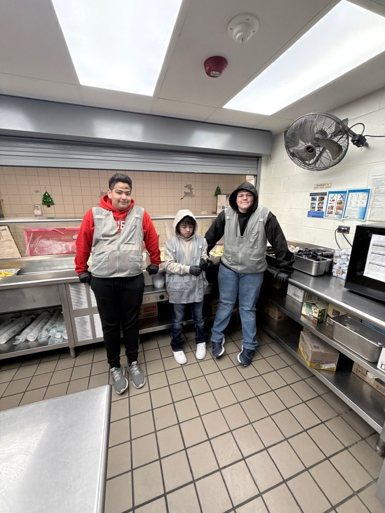 TMP-M students ready to serve at the Samaritan House homeless shelter.