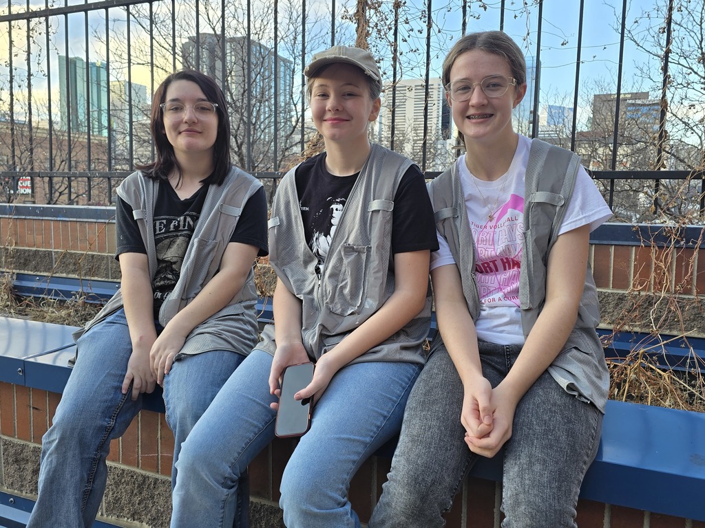 Volunteers posing on the terrace of Samaritan House in Denver