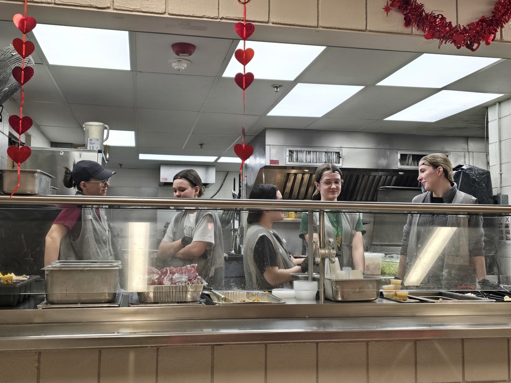 People at the serving line at Samaritan House.