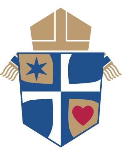 Diocese of Salina Shield w blue star in top left corner and red heart in lower right corner