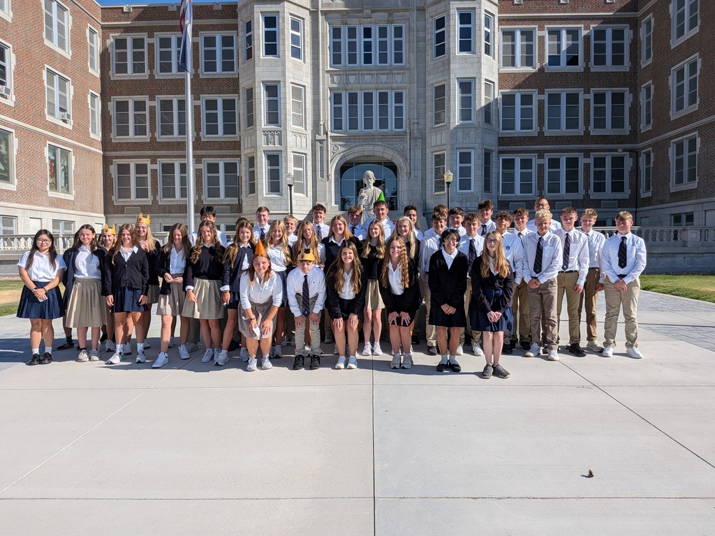 TMP-Marian students standing in front of the main school building