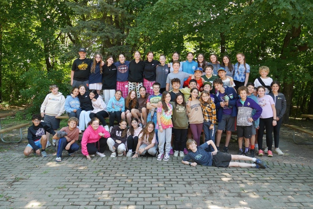 middle school students pose for group picture