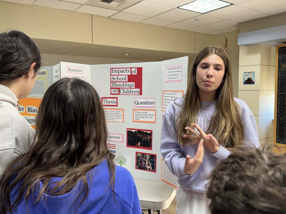 eighth grader presents these to other students