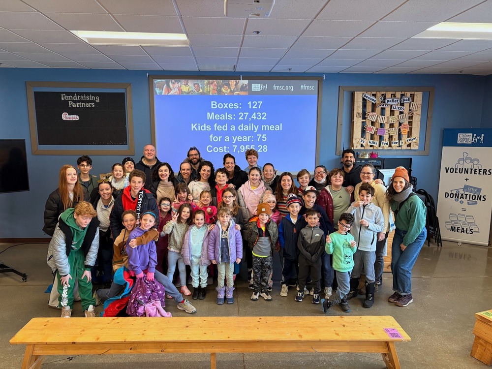 SJA families at Feed My Starving Children: Boxes 127, Meals 27,432, Kids fed a daily meal for a year 75