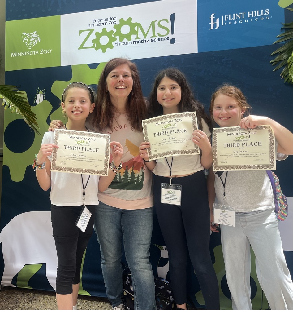ZOOMS third place winners with teacher