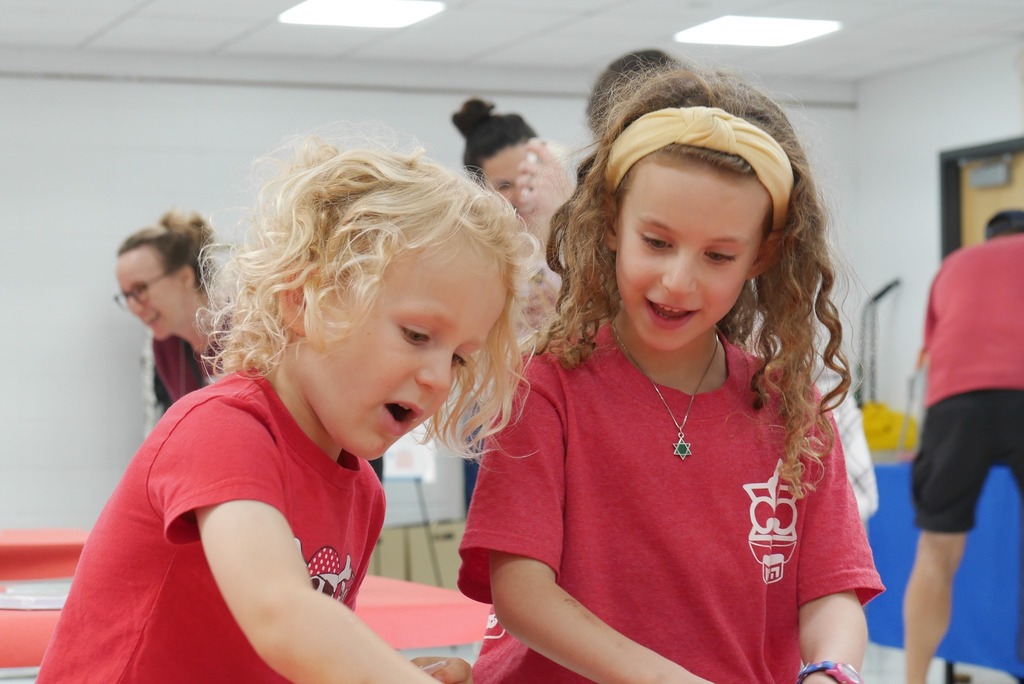 Two students smiling