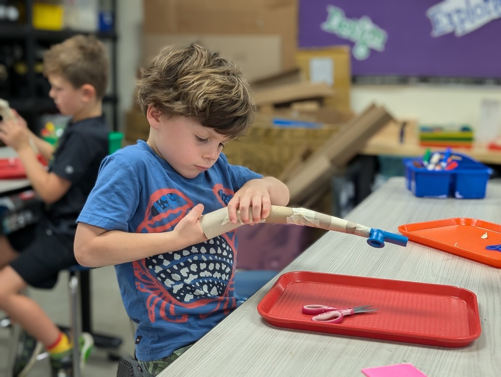 A student working on a craft