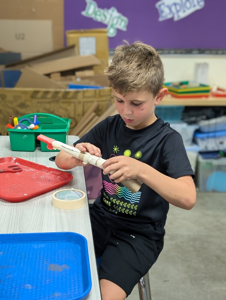 A student working on a craft