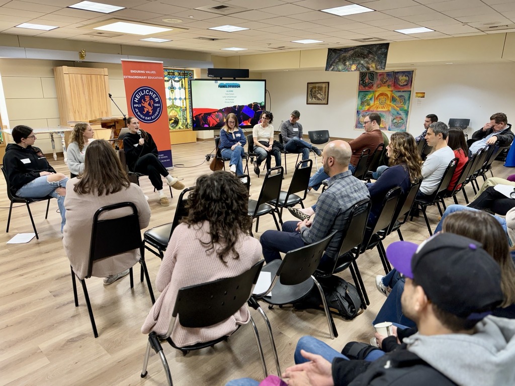 graduate speaks on alumni panel