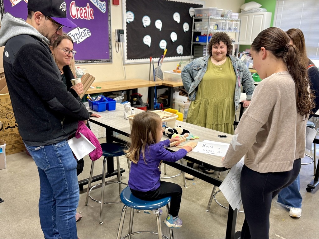 touring child builds with blocks in makerspace