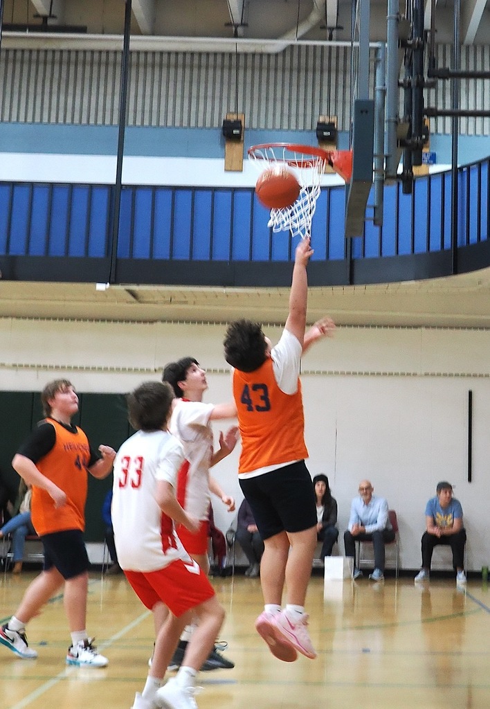 basketball play shoots layup