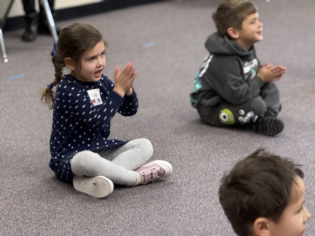 pre-k students clap