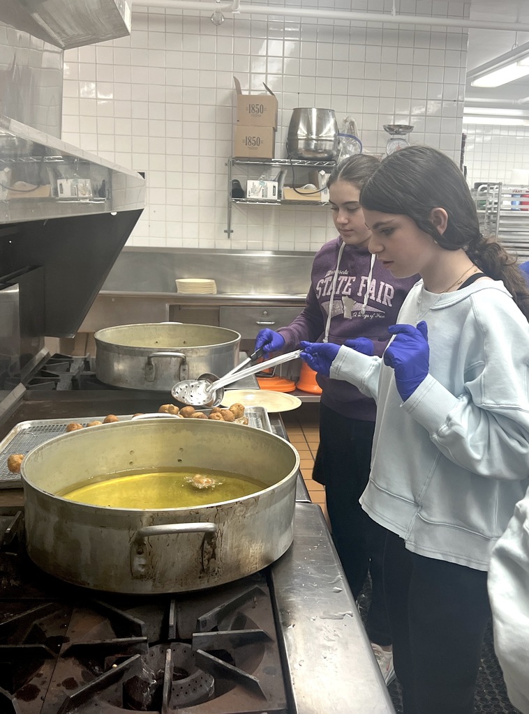 students fry dough