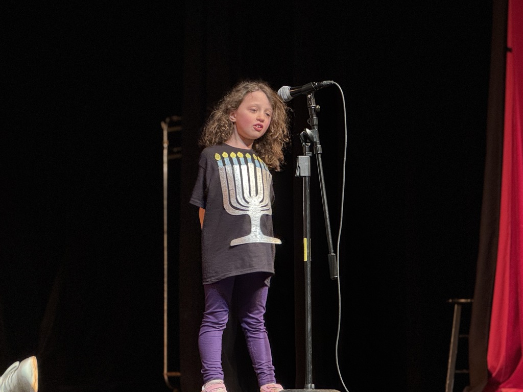 student perform The Latke Is Too Big!
