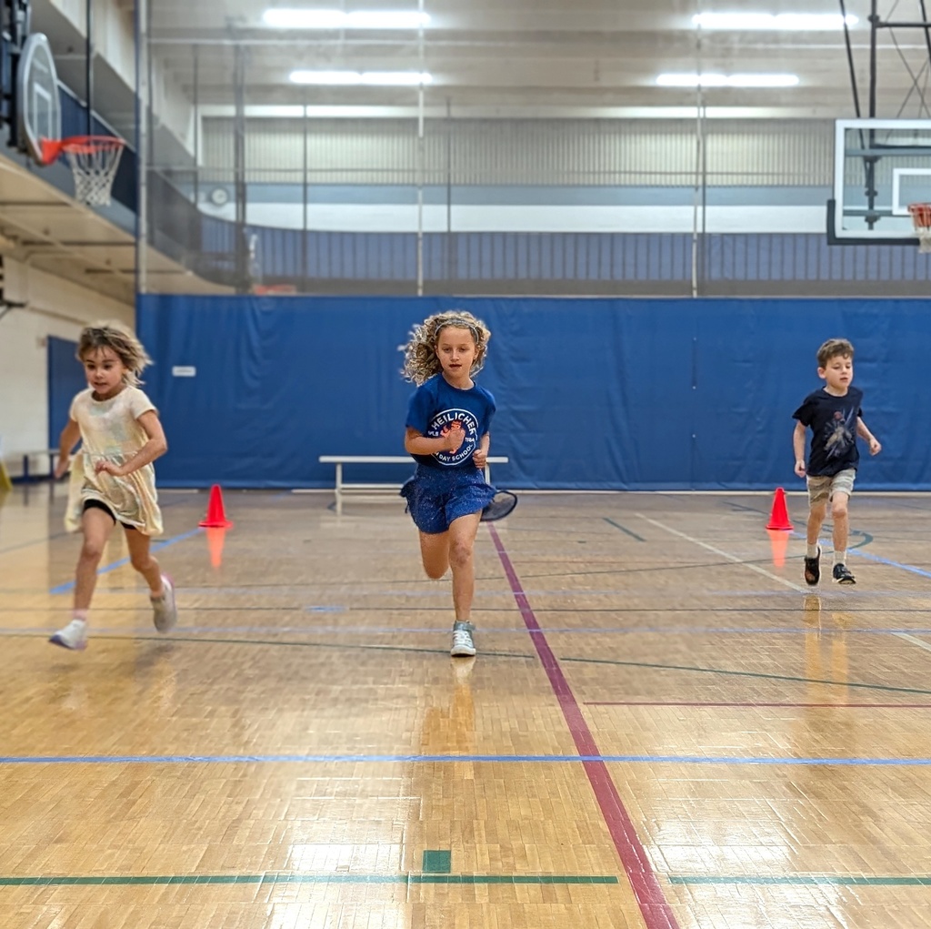 first graders run in gym
