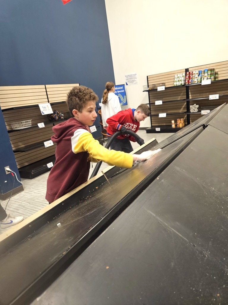 students clean shelves