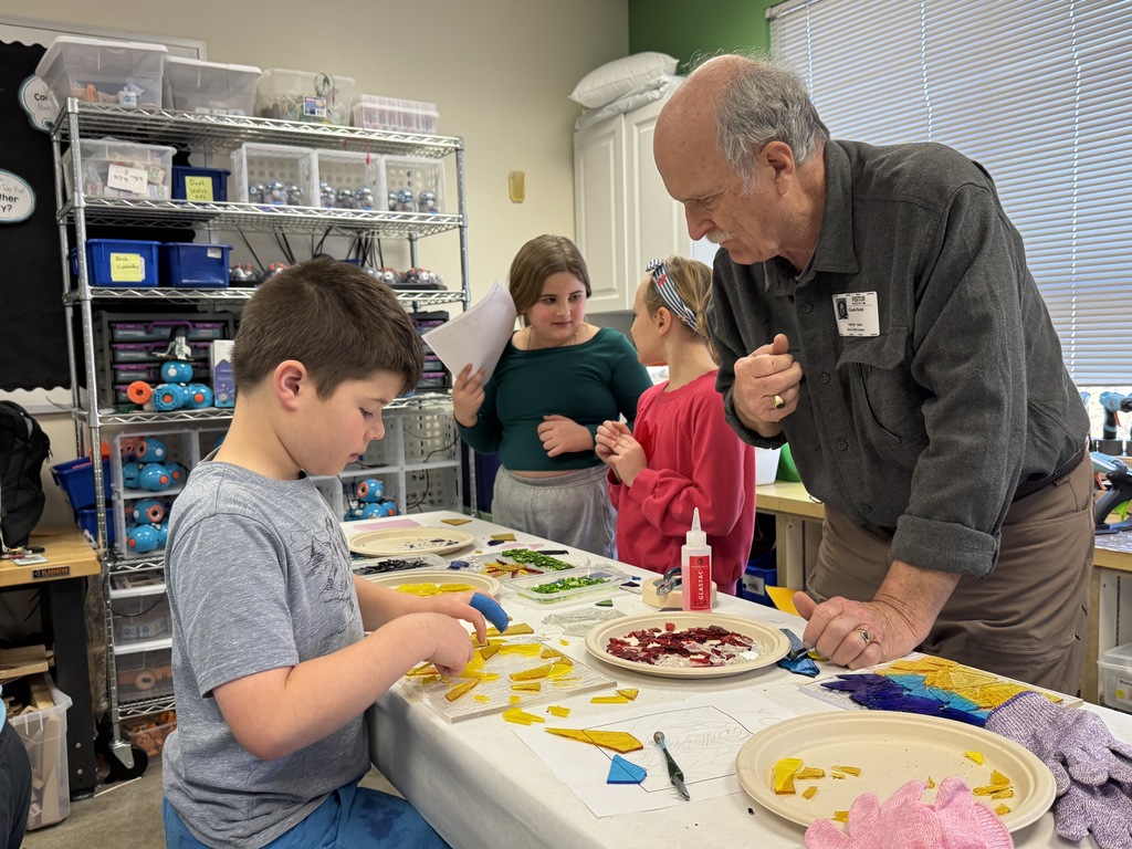 Claude Riedel guides student