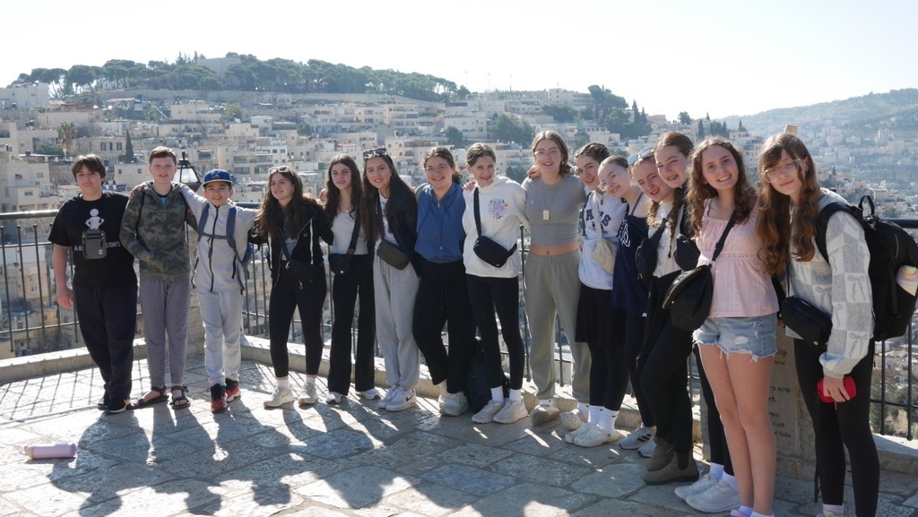 students pose at overlook of Jerusalem