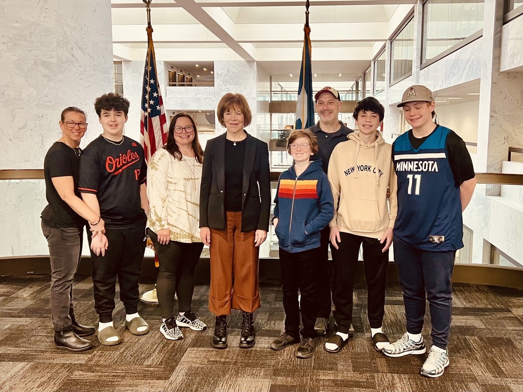 students and parents with Senator Tina Smith