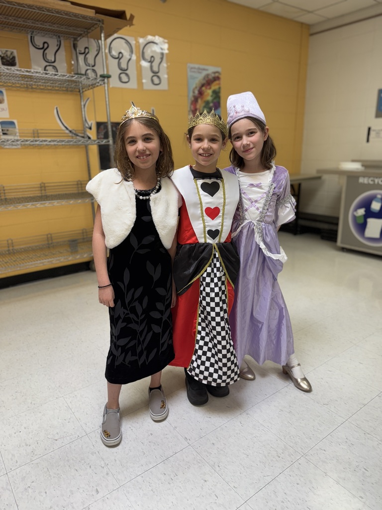 girls in princess and queen dresses with crowns