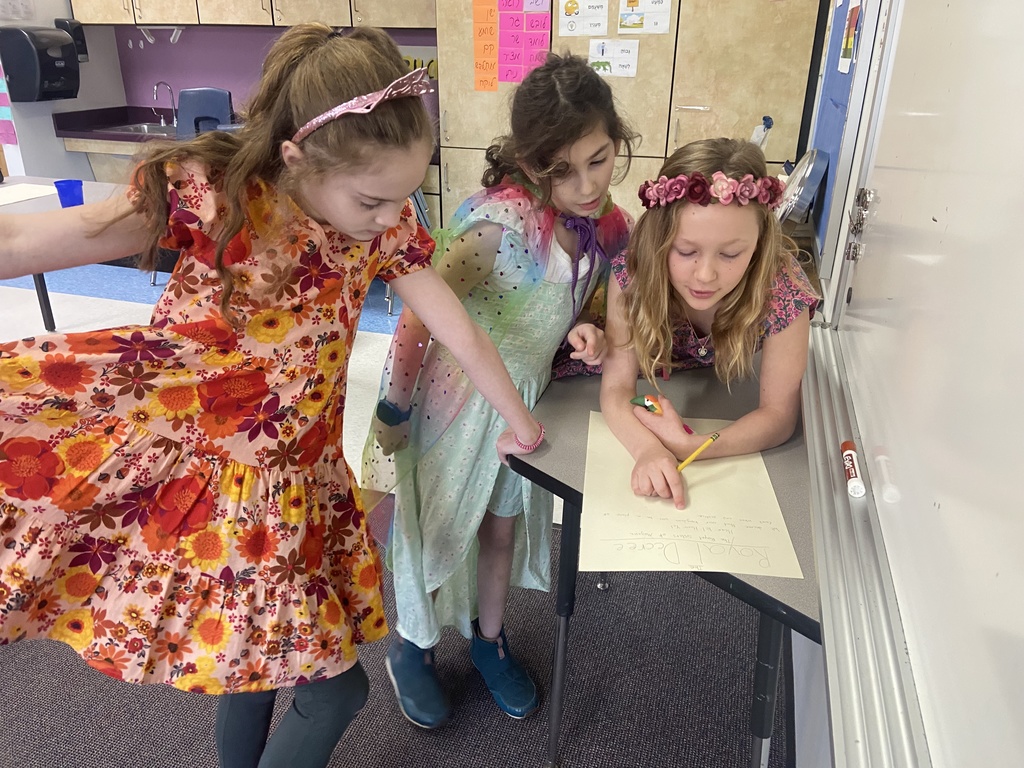 fifth graders dressed as princesses write royal decree