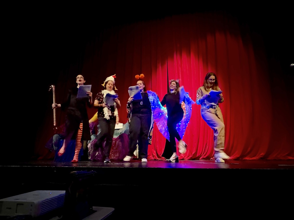 teachers, staff sing and dance