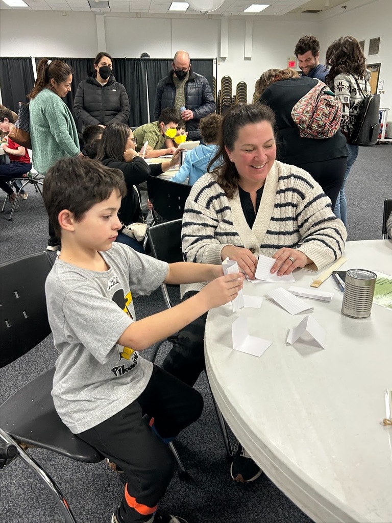 mother and son do building activity